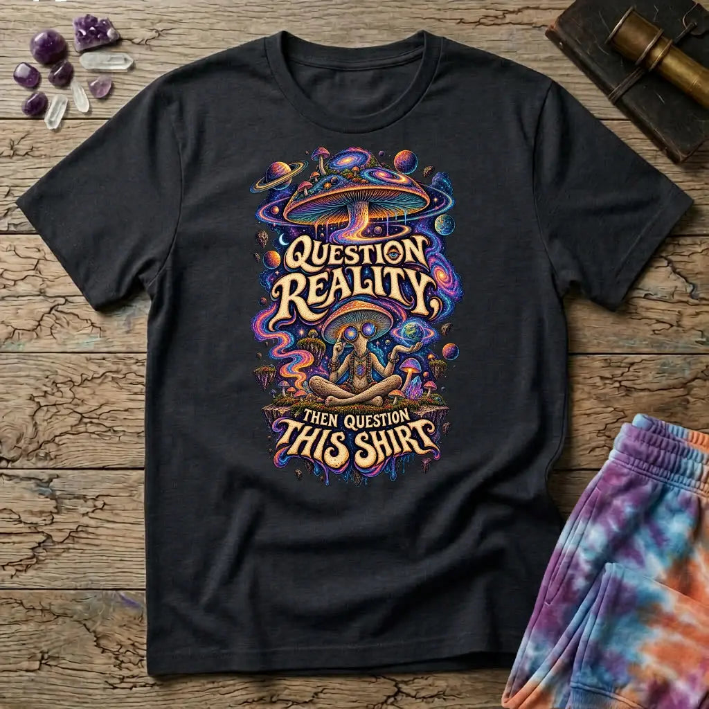 Question Reality, Then Question This Shirt lettering around a cosmic mushroom and a meditating figure, on a Black unisex t-shirt