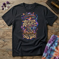 Question Reality, Then Question This Shirt lettering around a cosmic mushroom and a meditating figure, on a Black unisex t-shirt