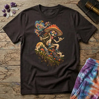 A sunglasses-wearing mushroom riding a skateboard past pines and a full moon, on a Dark Chocolate unisex t-shirt