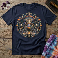 Cosmic mushroom mandala of moon phases, ringed planets and an opal orb, on a Navy unisex t-shirt