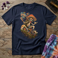 A sunglasses-wearing mushroom riding a skateboard past pines and a full moon, on a Navy unisex t-shirt