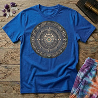 Tarnished bronze medallion of moon phases, constellations and mushroom caps around a glowing eye, on a Royal blue unisex t-shirt