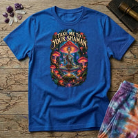 Take Me to Your Shaman lettering above a neon amanita-crowned figure meditating in a glowing forest, on a Royal blue unisex t-shirt