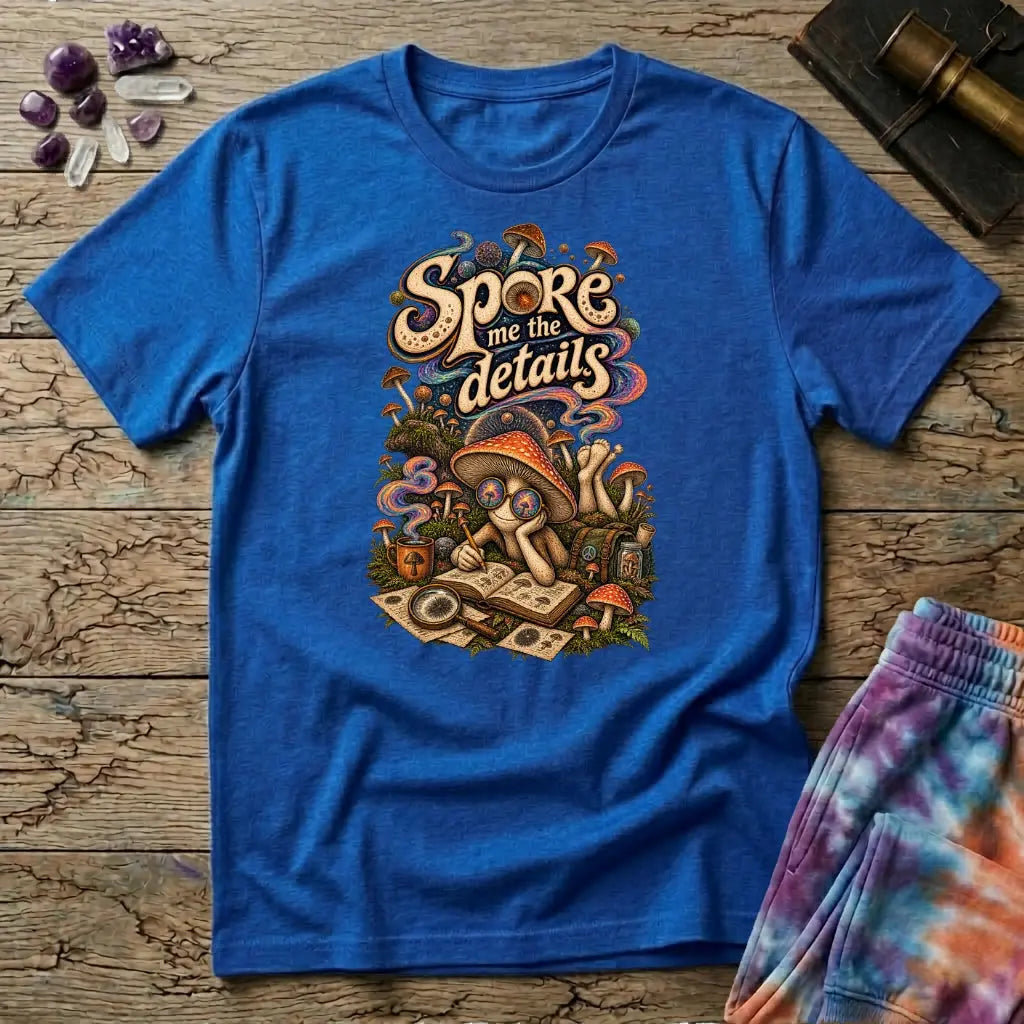 Spore Me the Details lettering above a mushroom character taking notes over spore prints, on a Royal blue unisex t-shirt