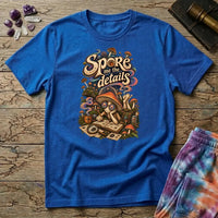 Spore Me the Details lettering above a mushroom character taking notes over spore prints, on a Royal blue unisex t-shirt