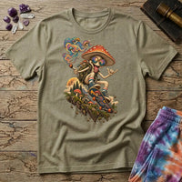 A sunglasses-wearing mushroom riding a skateboard past pines and a full moon, on a Sand unisex t-shirt