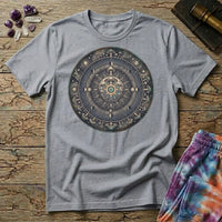 Tarnished bronze medallion of moon phases, constellations and mushroom caps around a glowing eye, on a Sport Grey unisex t-shirt