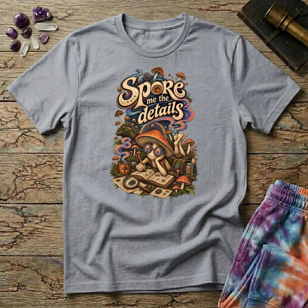 Spore Me the Details lettering above a mushroom character taking notes over spore prints, on a Sport Grey unisex t-shirt