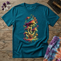 Cluster of neon mushrooms dripping color into a glowing puddle with rainbow tendrils and a floating planet, on a Tropical Blue unisex t-shirt
