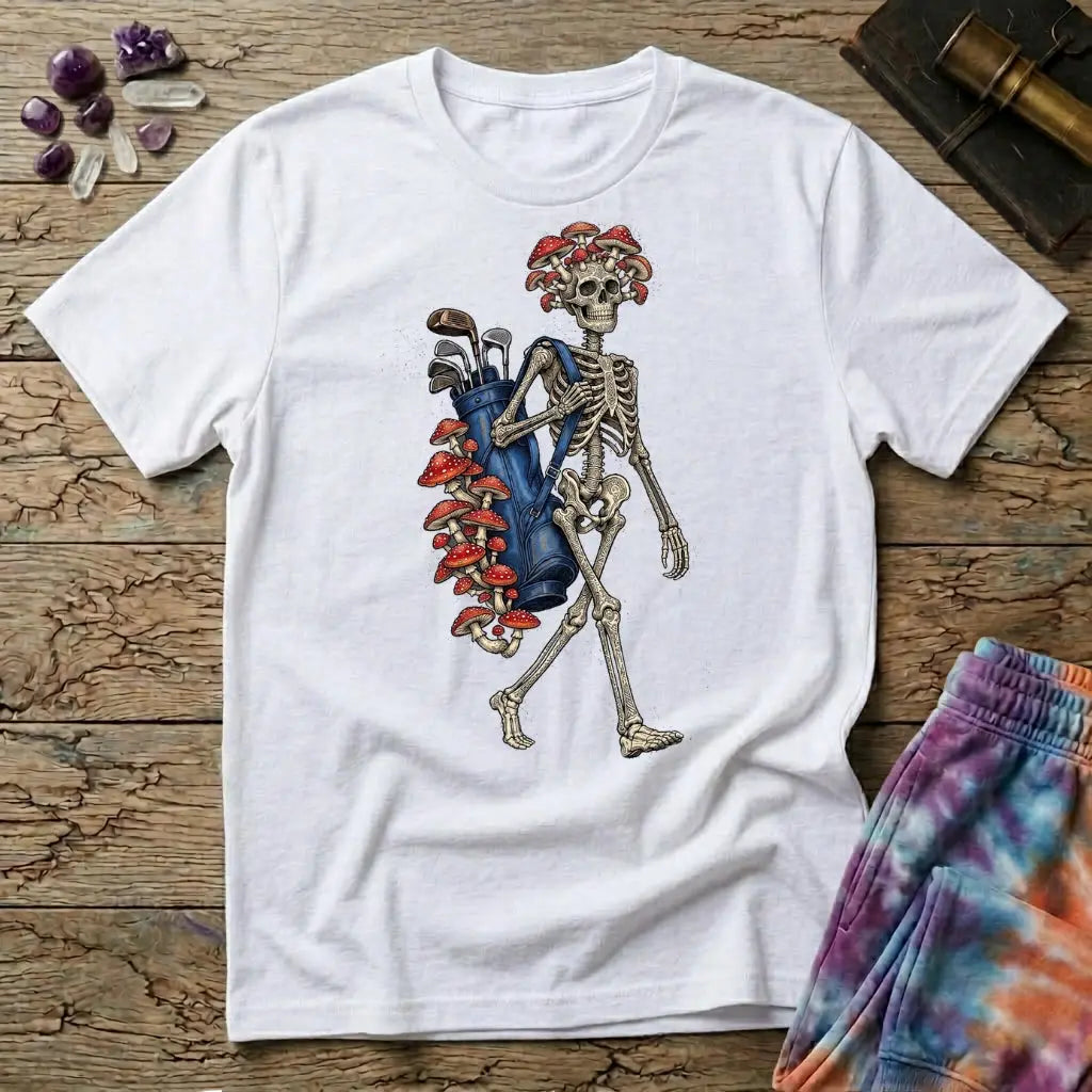 Skeleton carrying a navy golf bag with red amanita mushrooms sprouting from the clubs and skull, on a White unisex t-shirt
