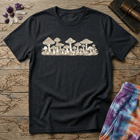 Naturalist cluster of mushrooms of varying caps and heights in fine cream linework, on a unisex t-shirt
