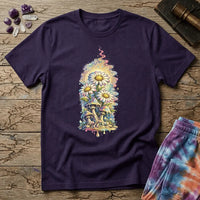 Daisies blooming from dripping mushrooms in front of a glowing sun mandala and rainbow trails, on a unisex t-shirt