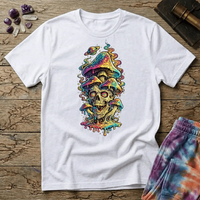 Grinning skull with hypnotic swirling eyes beneath a stack of dripping rainbow mushrooms and a small Saturn, on a unisex t-shirt