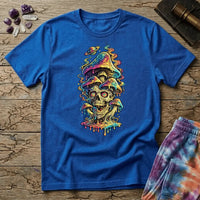 Grinning skull with hypnotic swirling eyes beneath a stack of dripping rainbow mushrooms and a small Saturn, on a unisex t-shirt