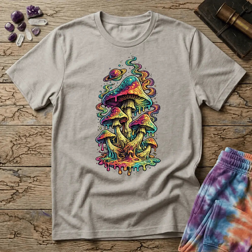Cluster of neon mushrooms dripping color into a glowing puddle with rainbow tendrils and a floating planet, on a unisex t-shirt