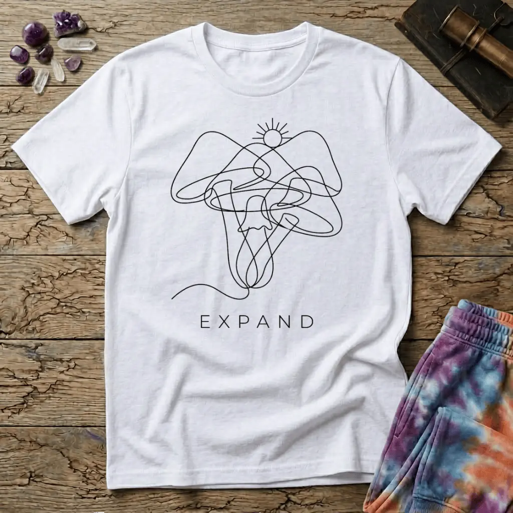 Single unbroken line tracing a rising sun into a cluster of mushroom caps and stems, minimalist line art, on a unisex t-shirt