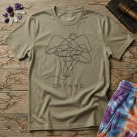 Single unbroken line tracing a rising sun into a cluster of mushroom caps and stems, minimalist line art, on a unisex t-shirt