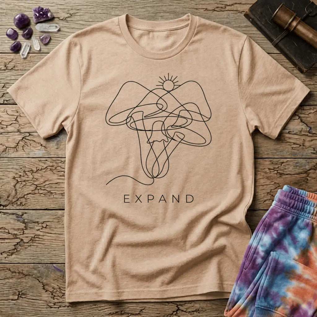 Single unbroken line tracing a rising sun into a cluster of mushroom caps and stems, minimalist line art, on a unisex t-shirt