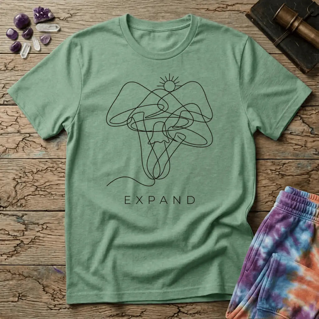Single unbroken line tracing a rising sun into a cluster of mushroom caps and stems, minimalist line art, on a unisex t-shirt