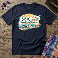 Retro airline-style badge with a plane soaring past a golden sunburst and rainbow streaks, reading LSD Travel Agency, on a unisex t-shirt