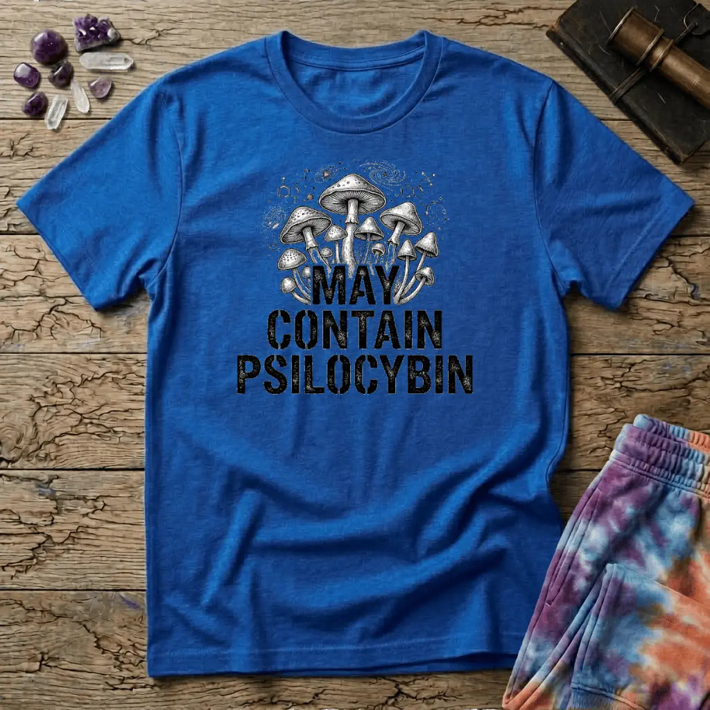 Hand-drawn mushrooms growing out of distressed May Contain Psilocybin lettering over faint molecular hexagons, on a unisex t-shirt