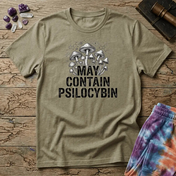 Hand-drawn mushrooms growing out of distressed May Contain Psilocybin lettering over faint molecular hexagons, on a unisex t-shirt
