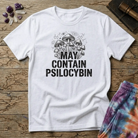 Hand-drawn mushrooms growing out of distressed May Contain Psilocybin lettering over faint molecular hexagons, on a unisex t-shirt