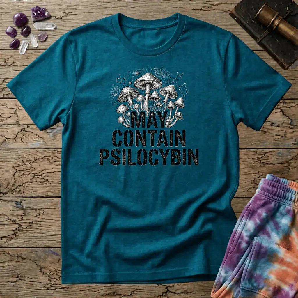 Hand-drawn mushrooms growing out of distressed May Contain Psilocybin lettering over faint molecular hexagons, on a unisex t-shirt