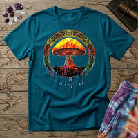 Watercolor mushroom in fiery reds and oranges framed by an ornate Celtic knotwork ring with roots trailing below, on a unisex t-shirt
