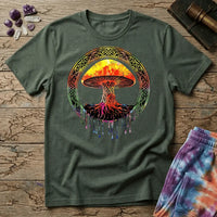 Watercolor mushroom in fiery reds and oranges framed by an ornate Celtic knotwork ring with roots trailing below, on a unisex t-shirt