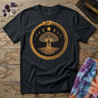 Coiled snake and a glowing moon framing a cluster of mushrooms in mystical nighttime imagery, on a unisex t-shirt