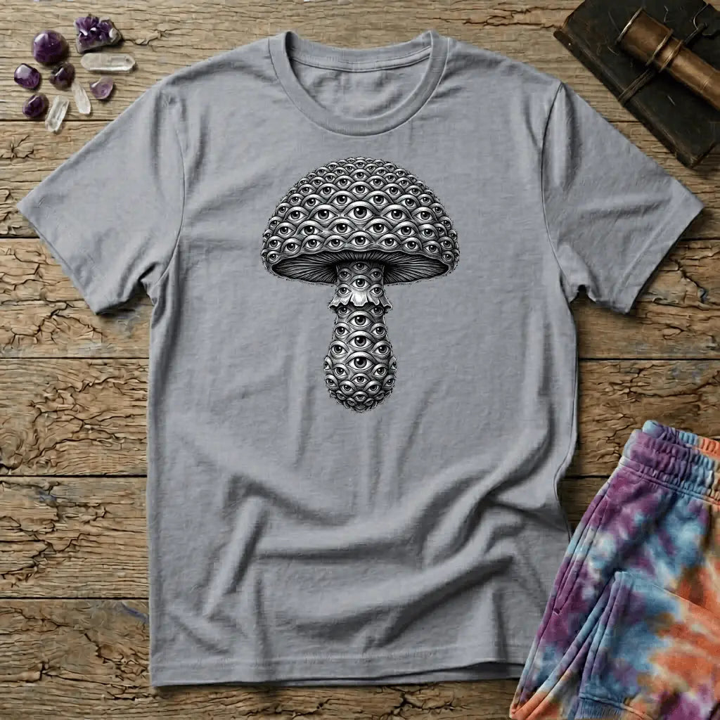 Mushroom engraved in fine silver-grey linework where every scale on the cap and stem is an open eye, on a unisex t-shirt